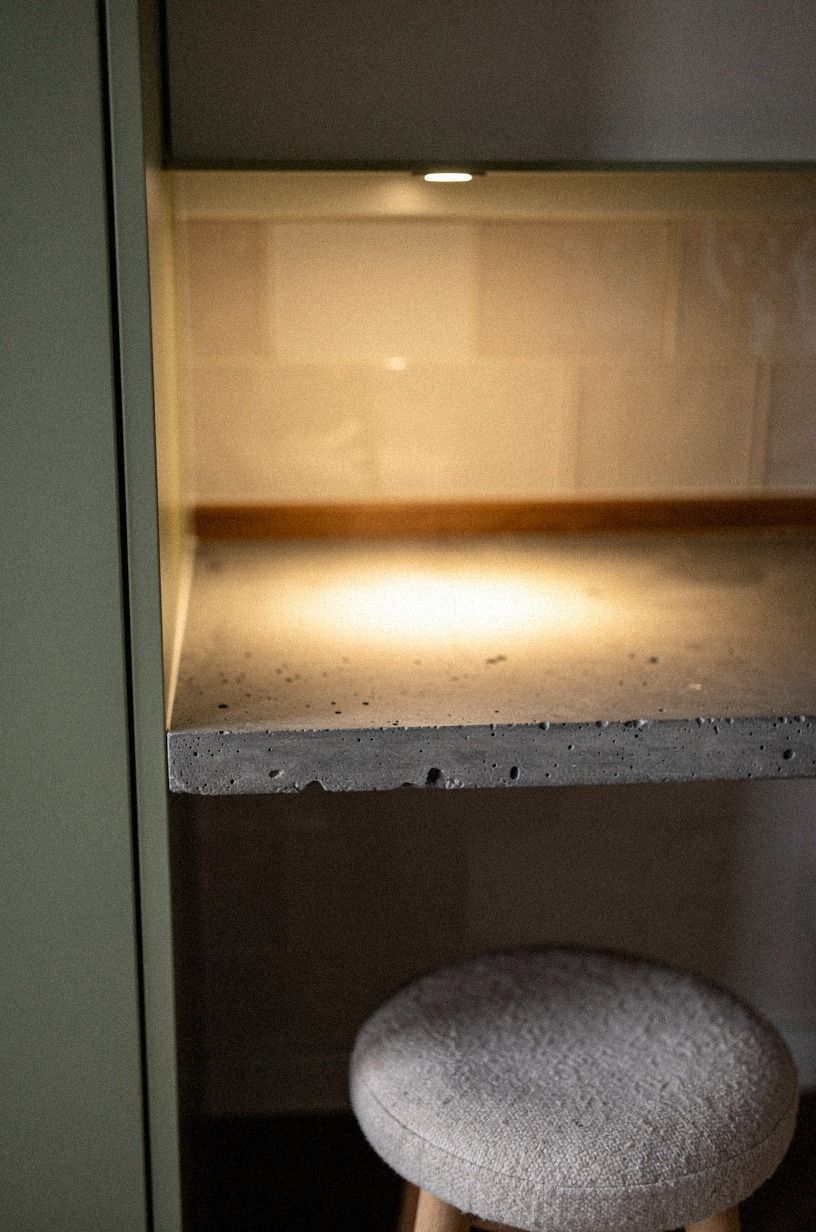 I placed tiny spots over the stove niche