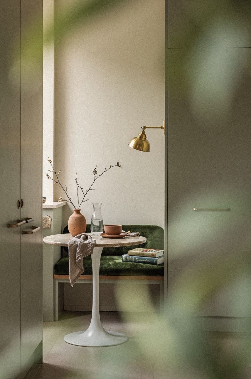 Place a tiny pedestal table in the pass through (The One-Leg Rule)