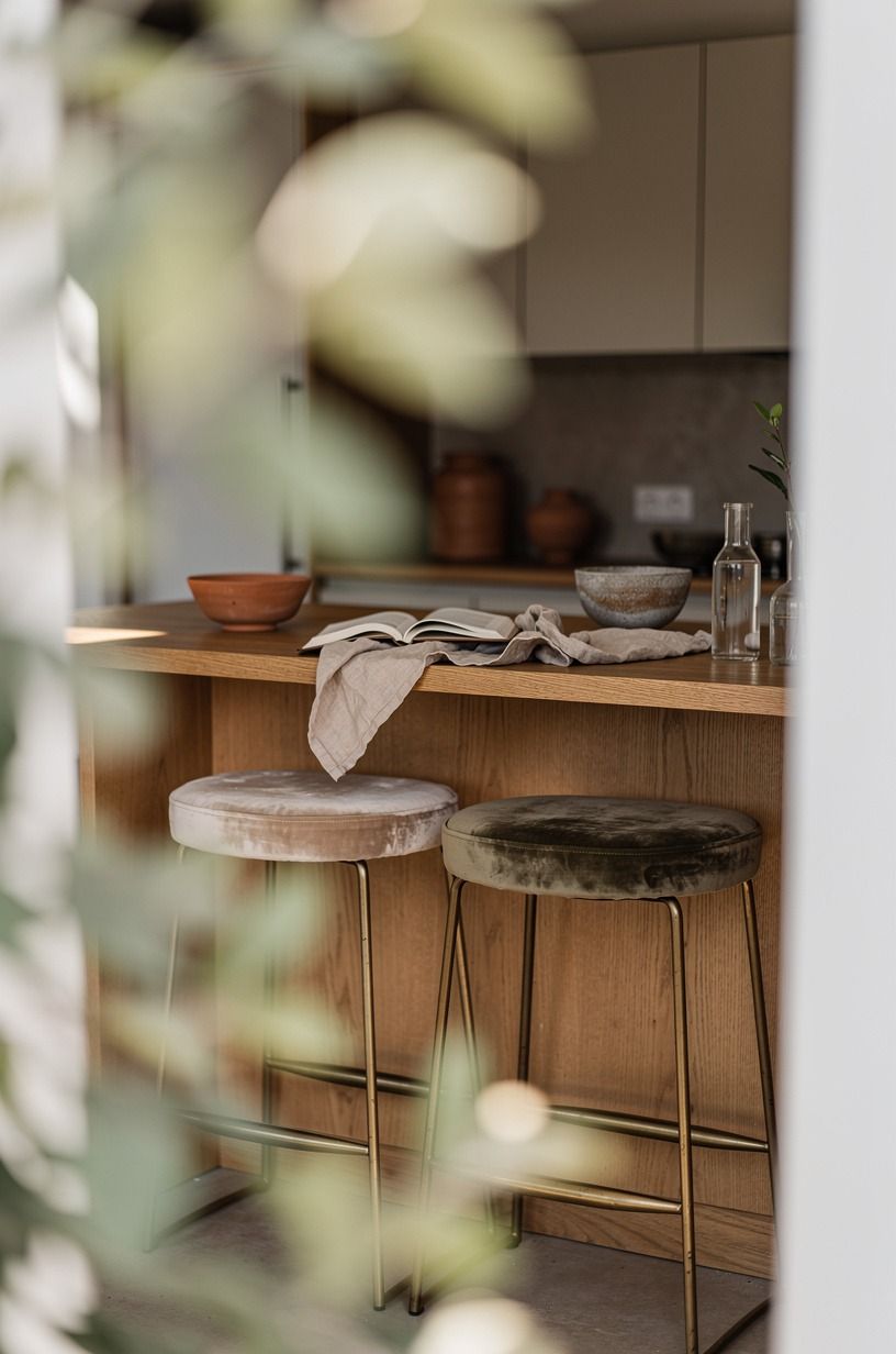 I Parked Backless Stools Beneath the Oak Overhang