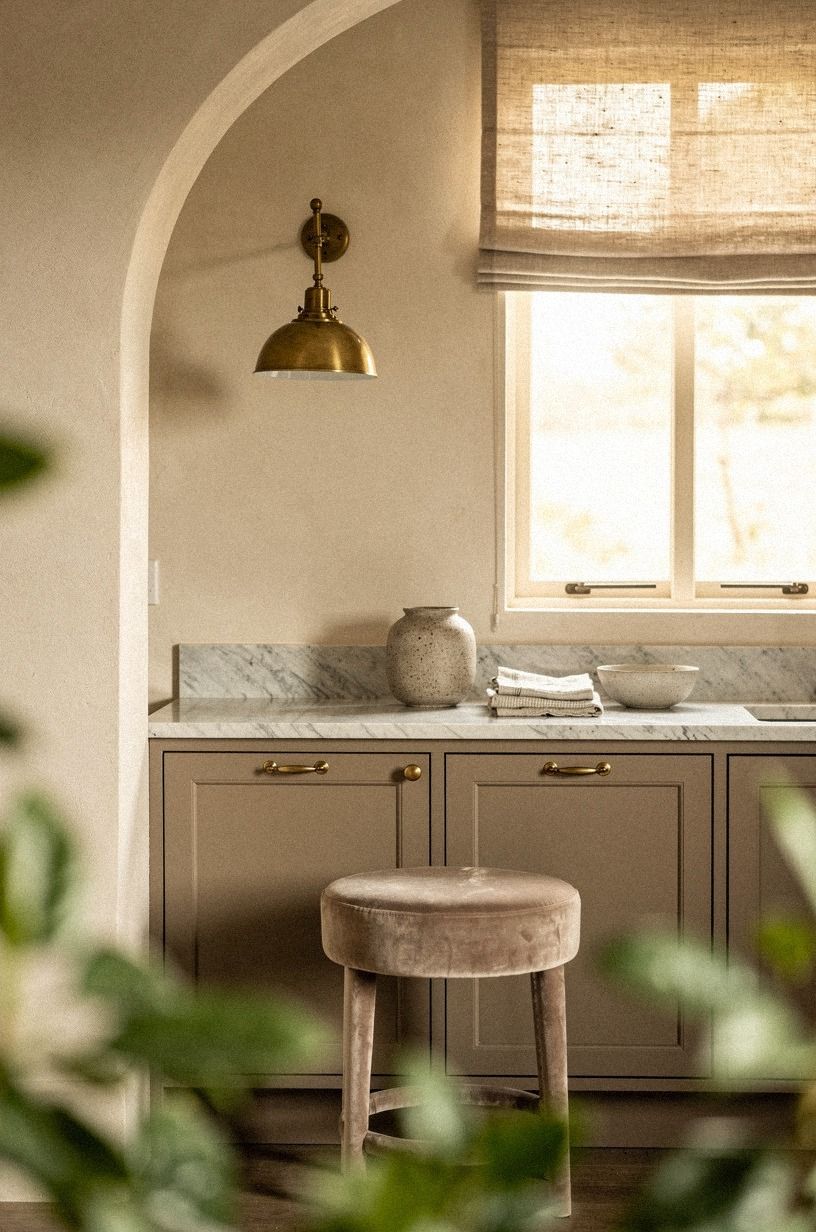 Finish clay-toned cabinets with marble veining