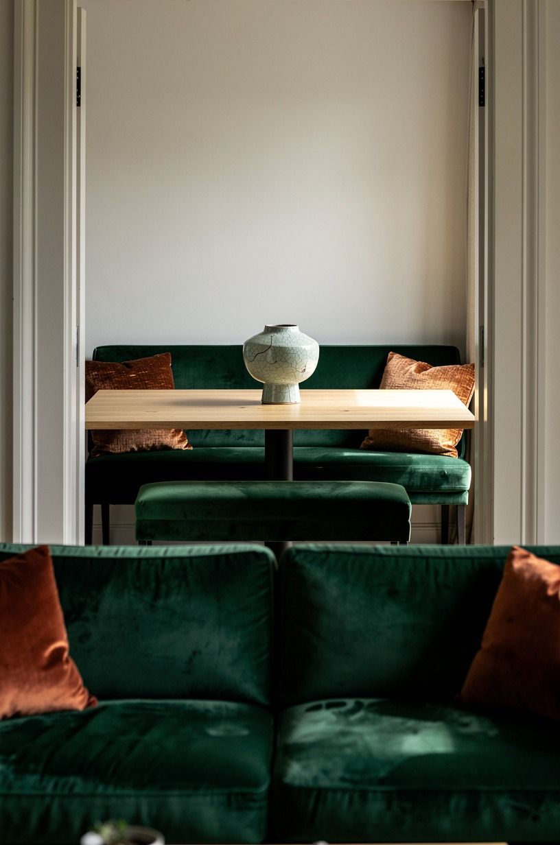 Stretch a rectangular table behind the sofa zone