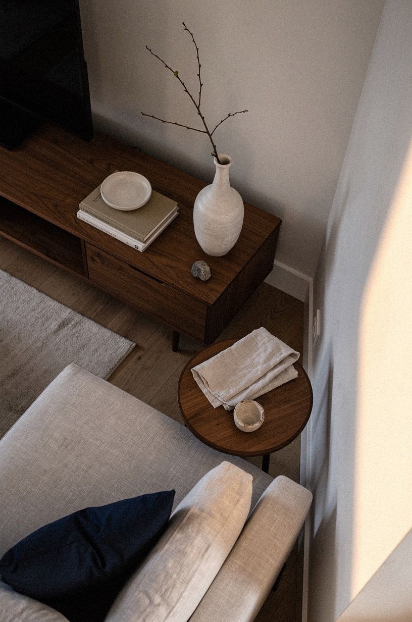 Why does a single stoneware vase carry the whole corner?