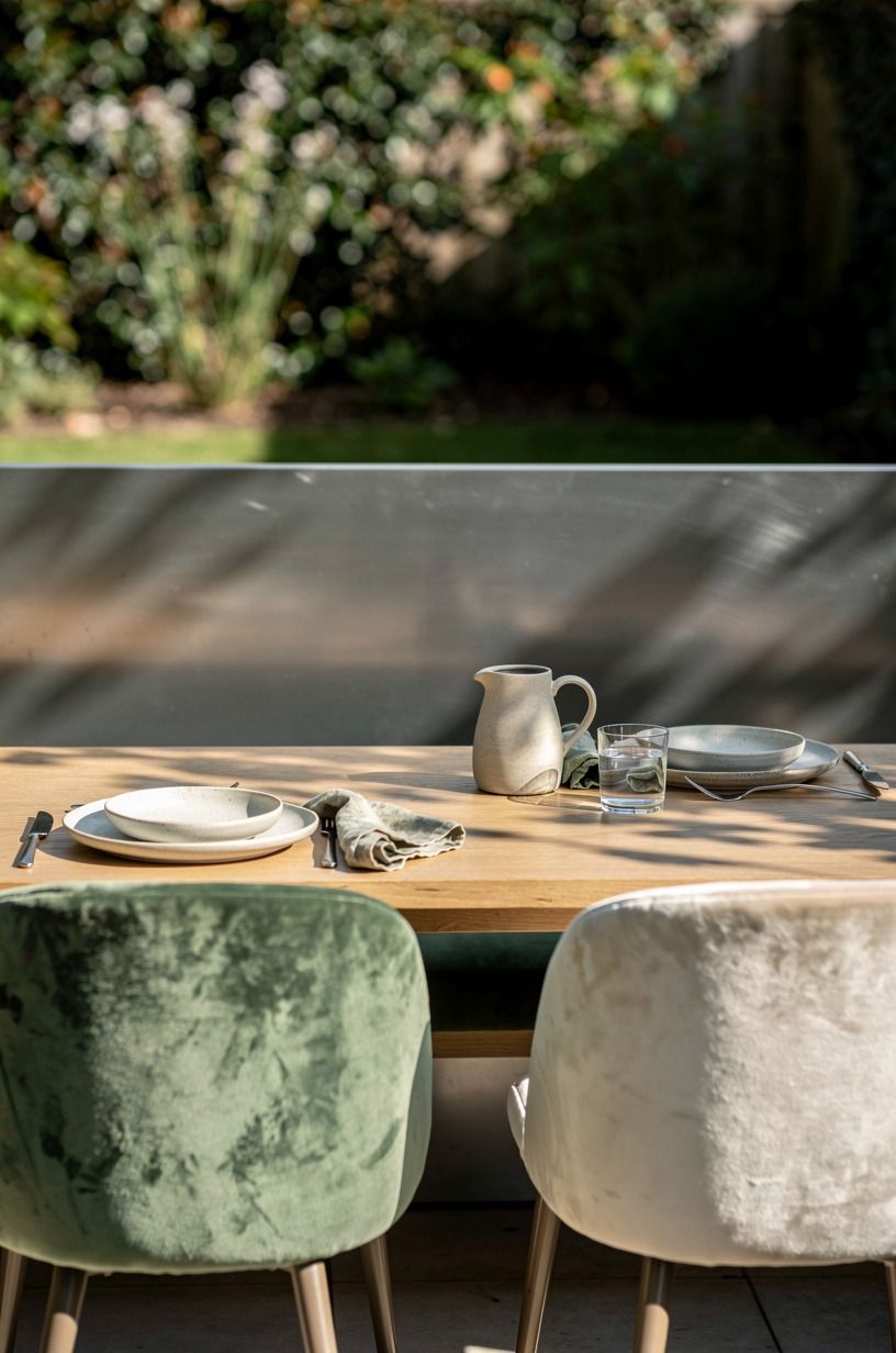 Anchor your dining nook with a low metal backdrop