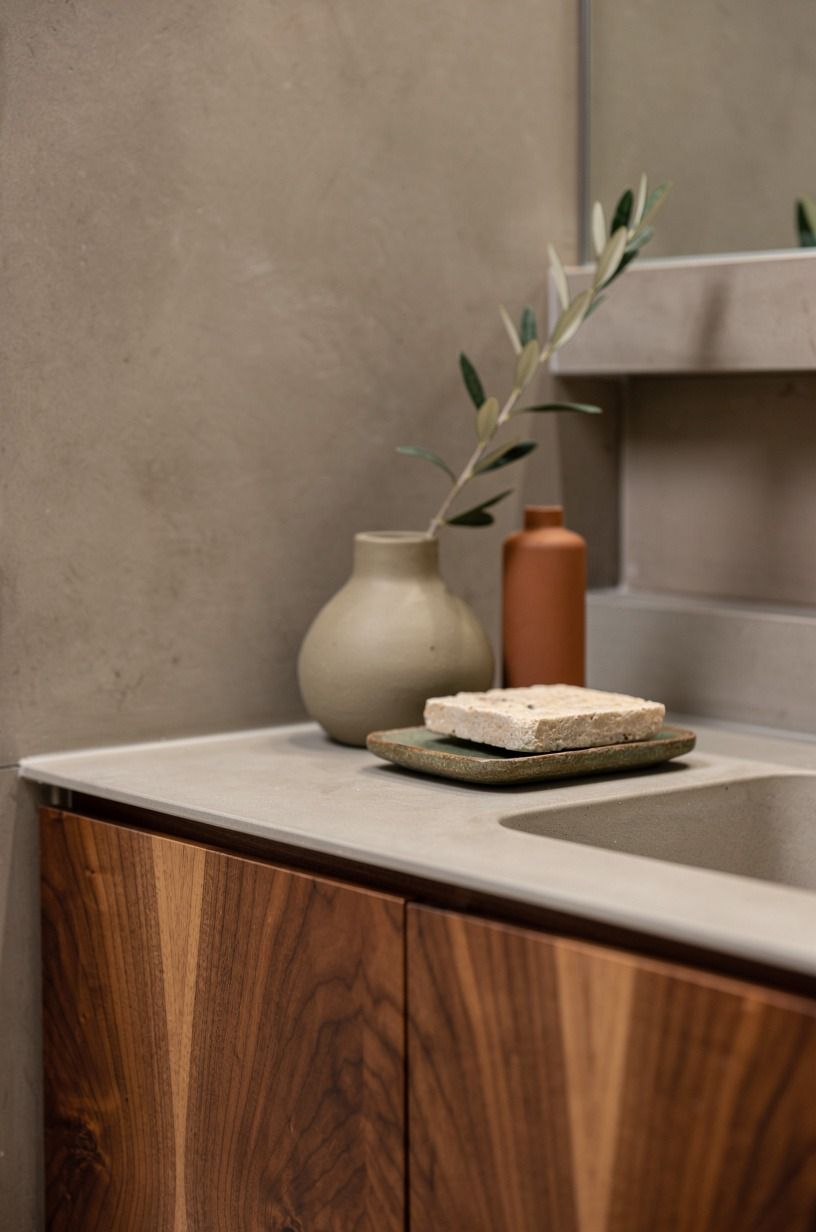 Choose microcement over fake stone panels