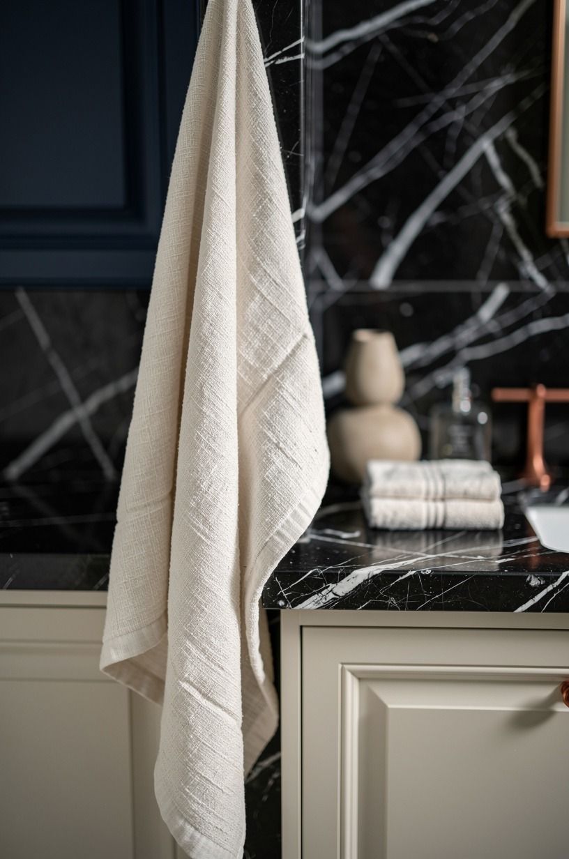 Hang linen where you’d normally add more tile