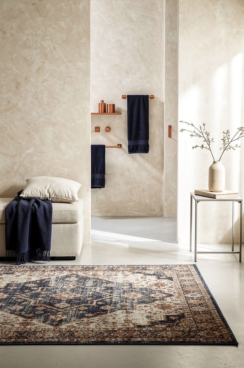 Use a small rug with an oversized feeling