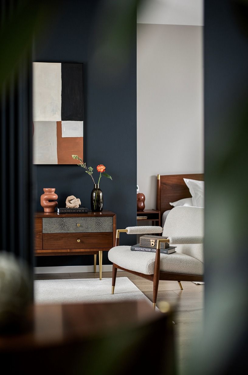 I kept the furniture, then softened its edges, midnight blue palette