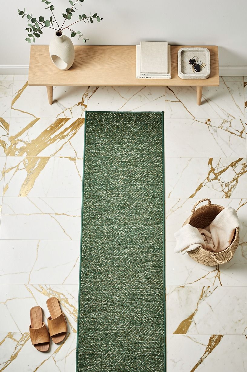 Layer a wool runner, not a tiny doormat