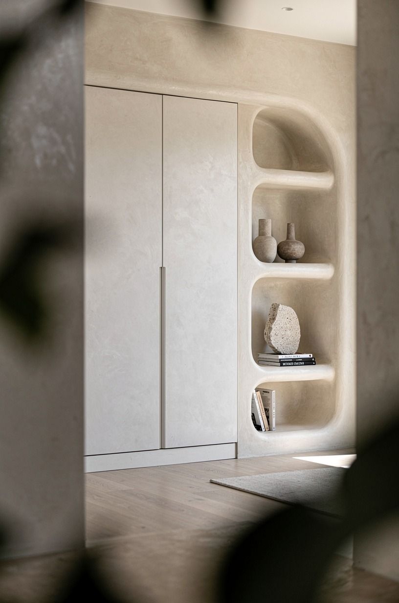 Paint the storage wall as one quiet block