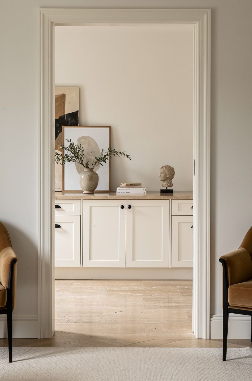 Layer art at counter height instead of filling upper walls