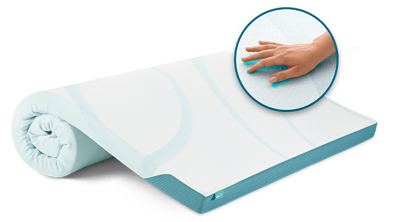 Hand pressed against the cool-to-the-touch cover of the TEMPUR-Adapt + Cooling topper