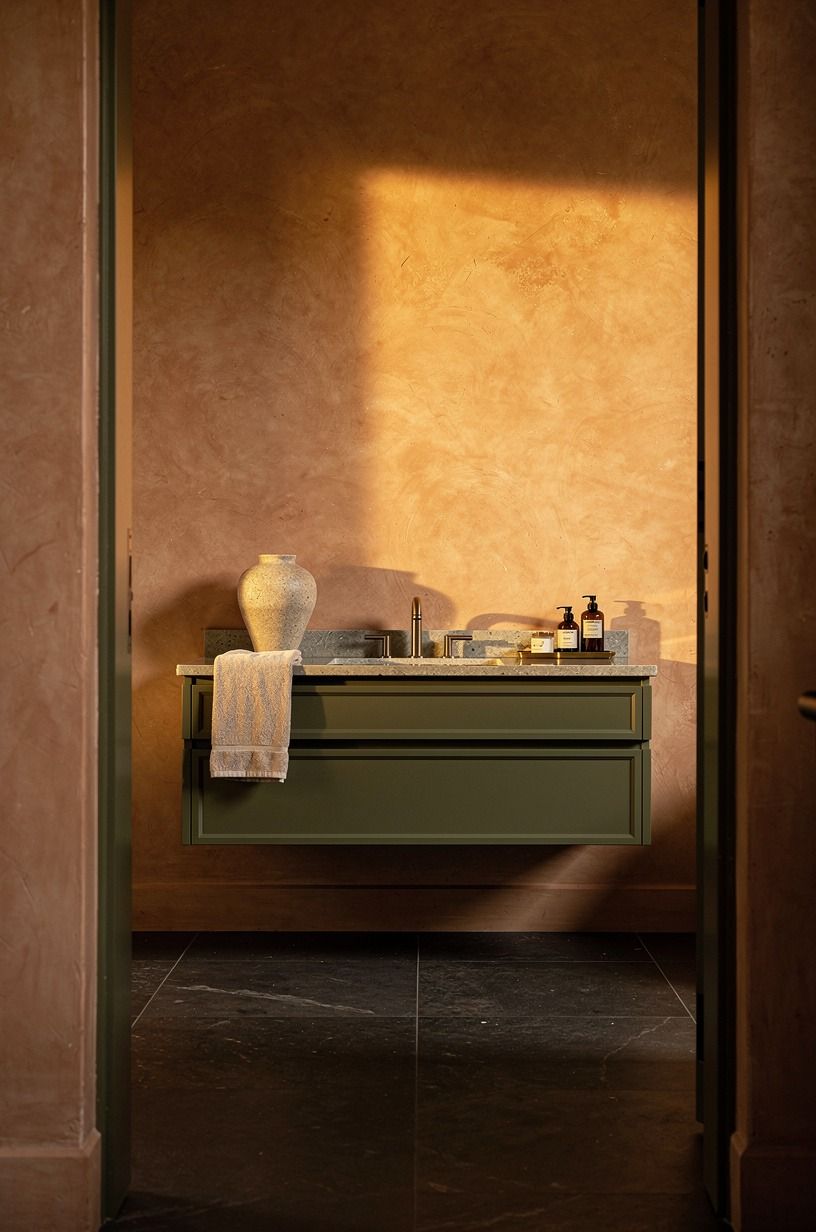 Float the vanity above a dark floor