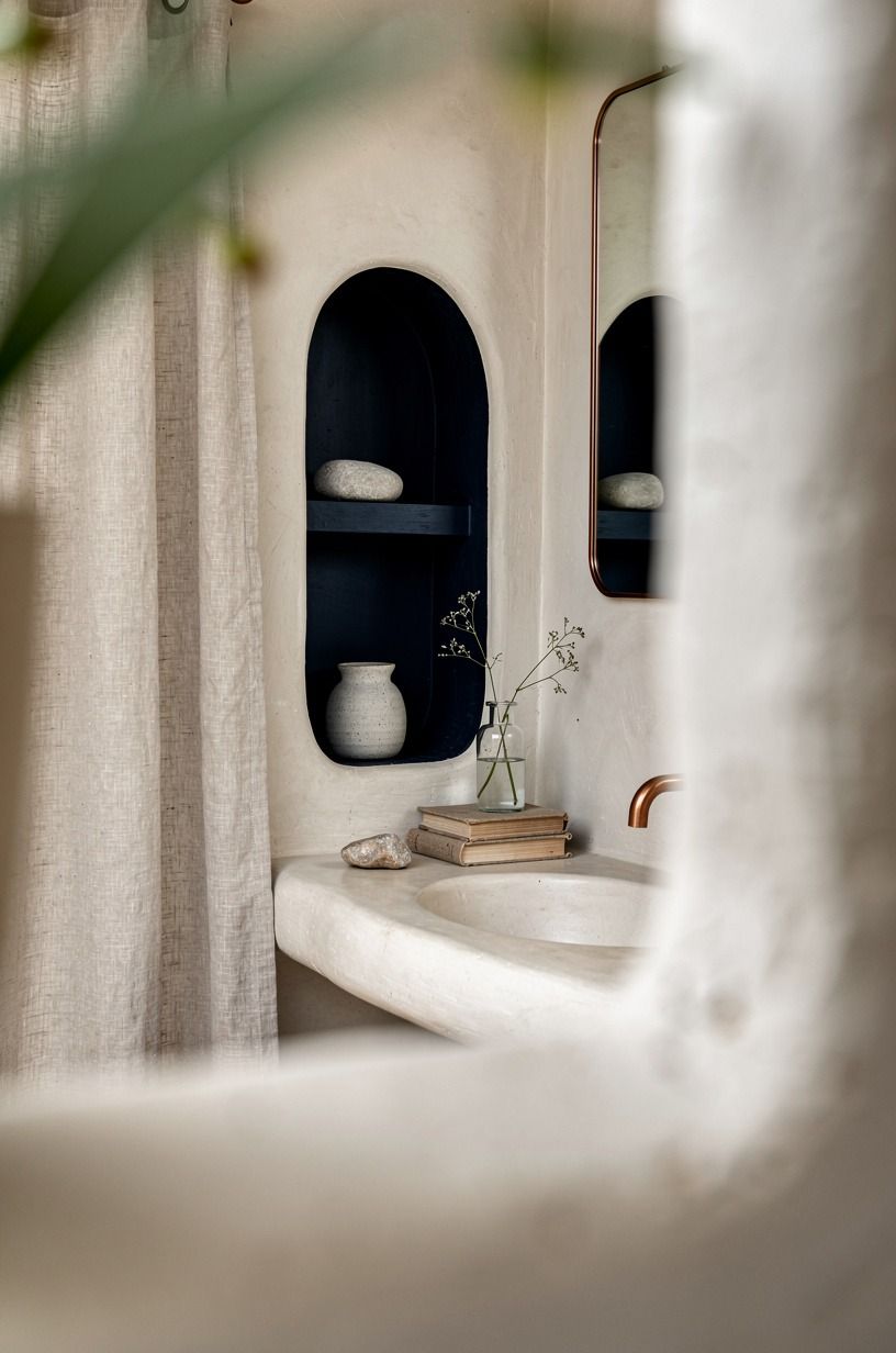 Make the small organic coastal bathroom feel finished
