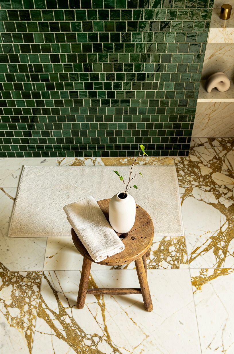 Put natural glazed zellige tile behind a vintage stool