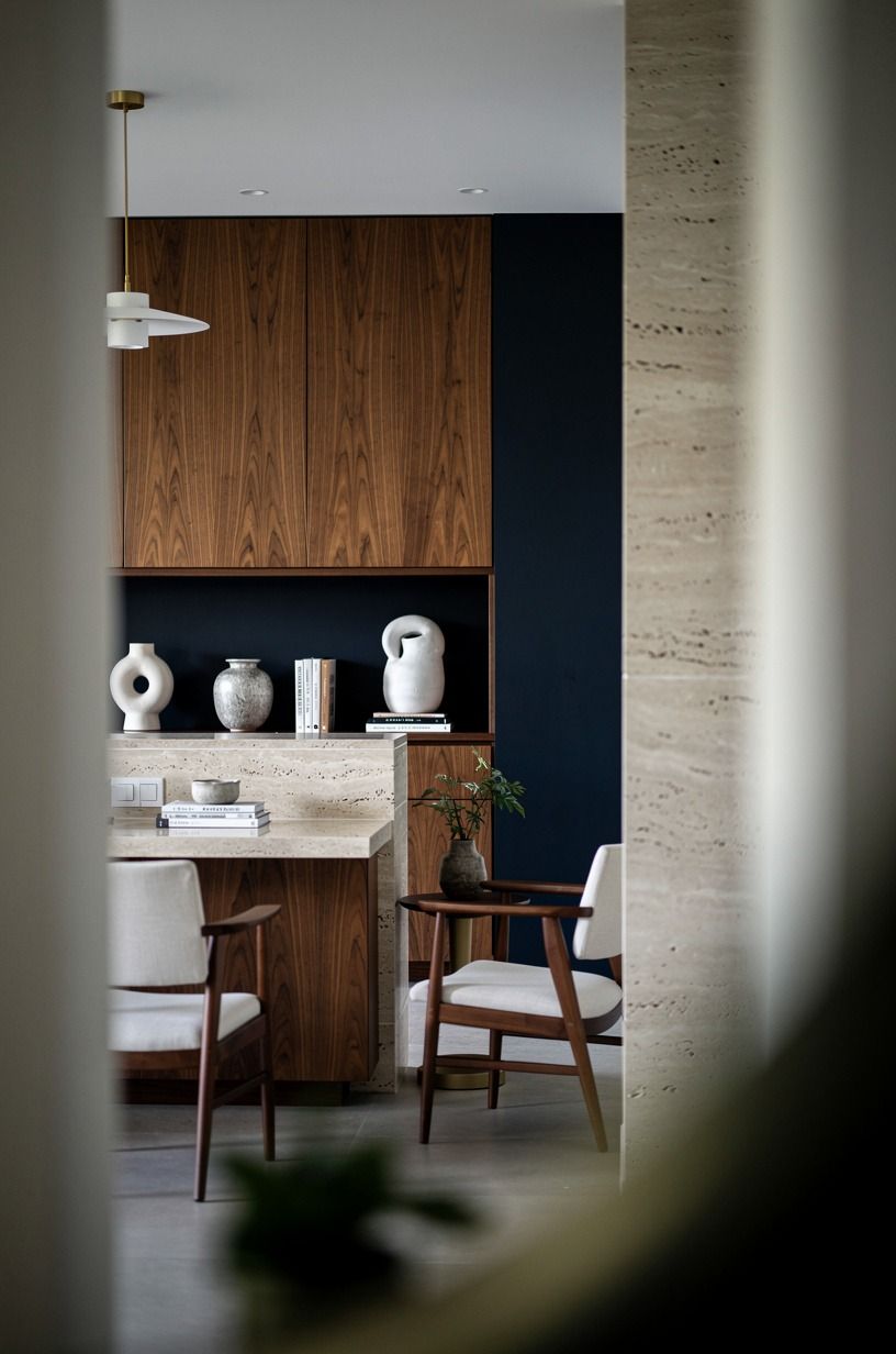 Use a limestone half wall instead of a full surround