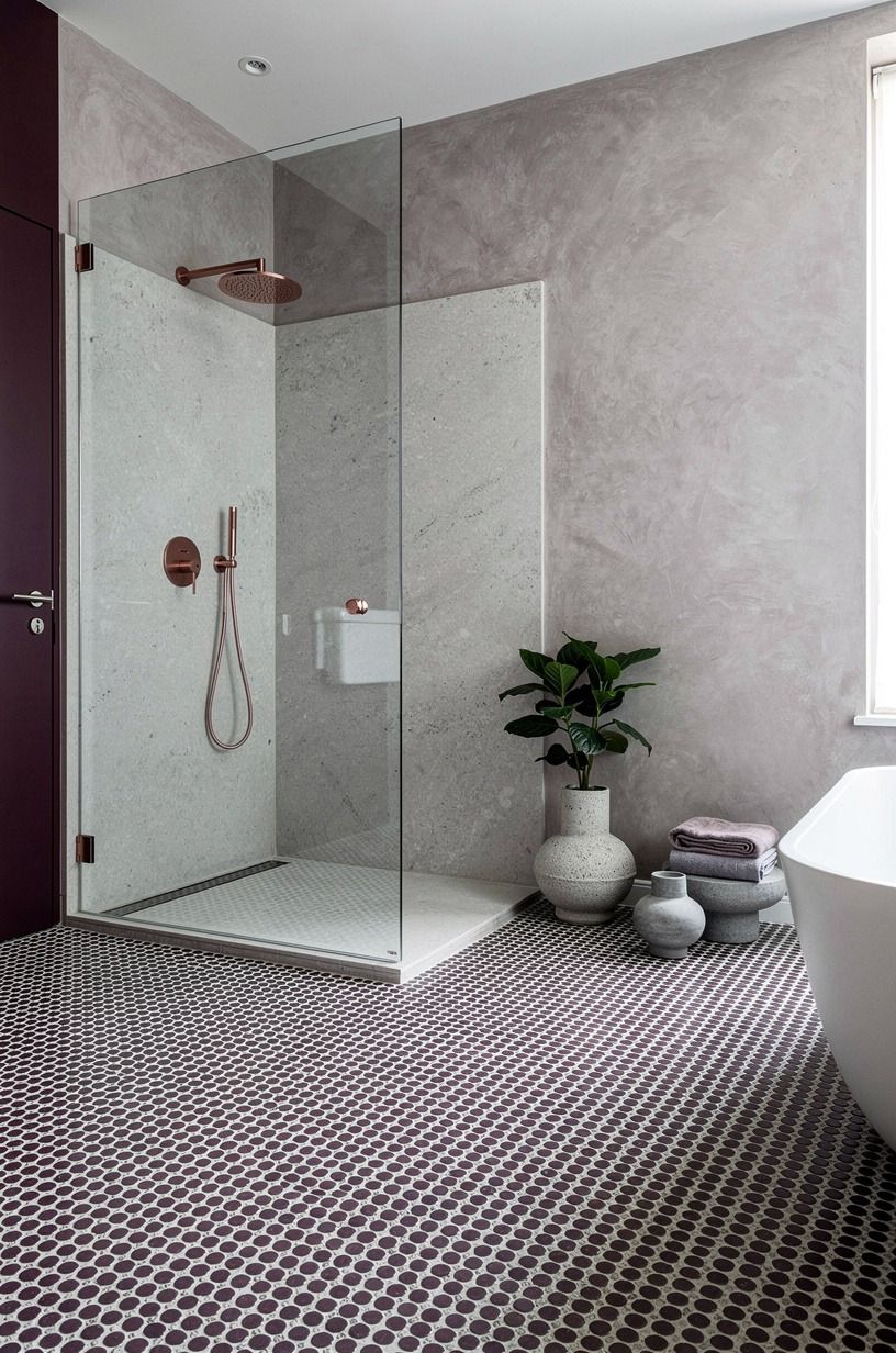 Use a Penny Tile Floor Under a Quiet Stone Shower