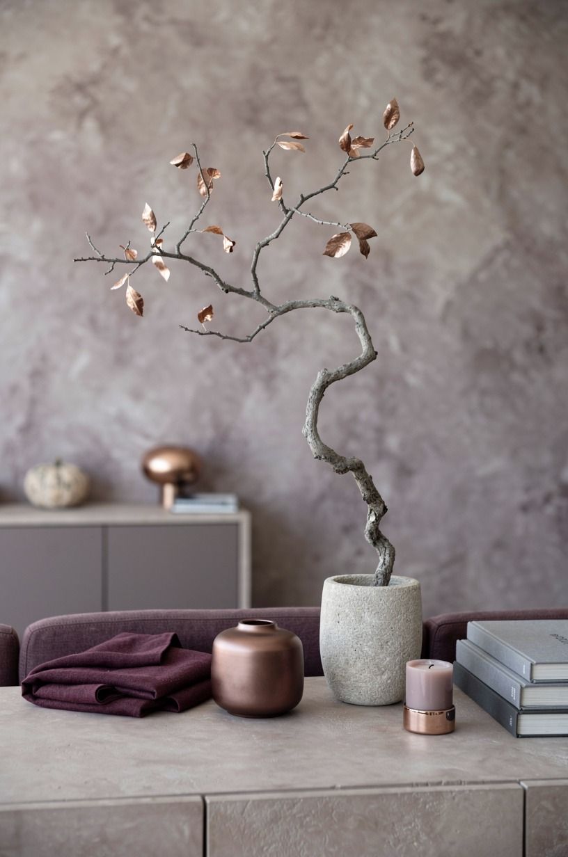 Swap a bowl of candy for a sculptural branch (organic halloween styling)