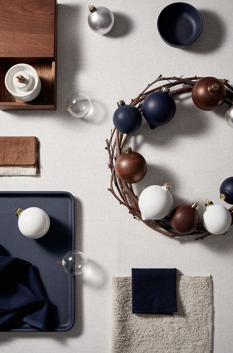 Layer ceramic ornaments on a branch circle