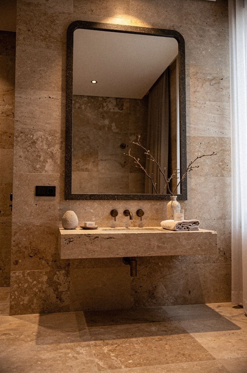Choose a stone bathroom mirror with a dark edge