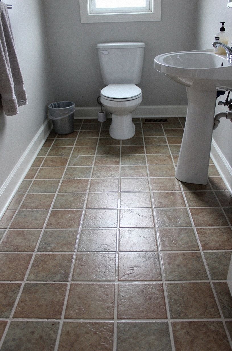 Fill the grout before laying peel and stick floor tile