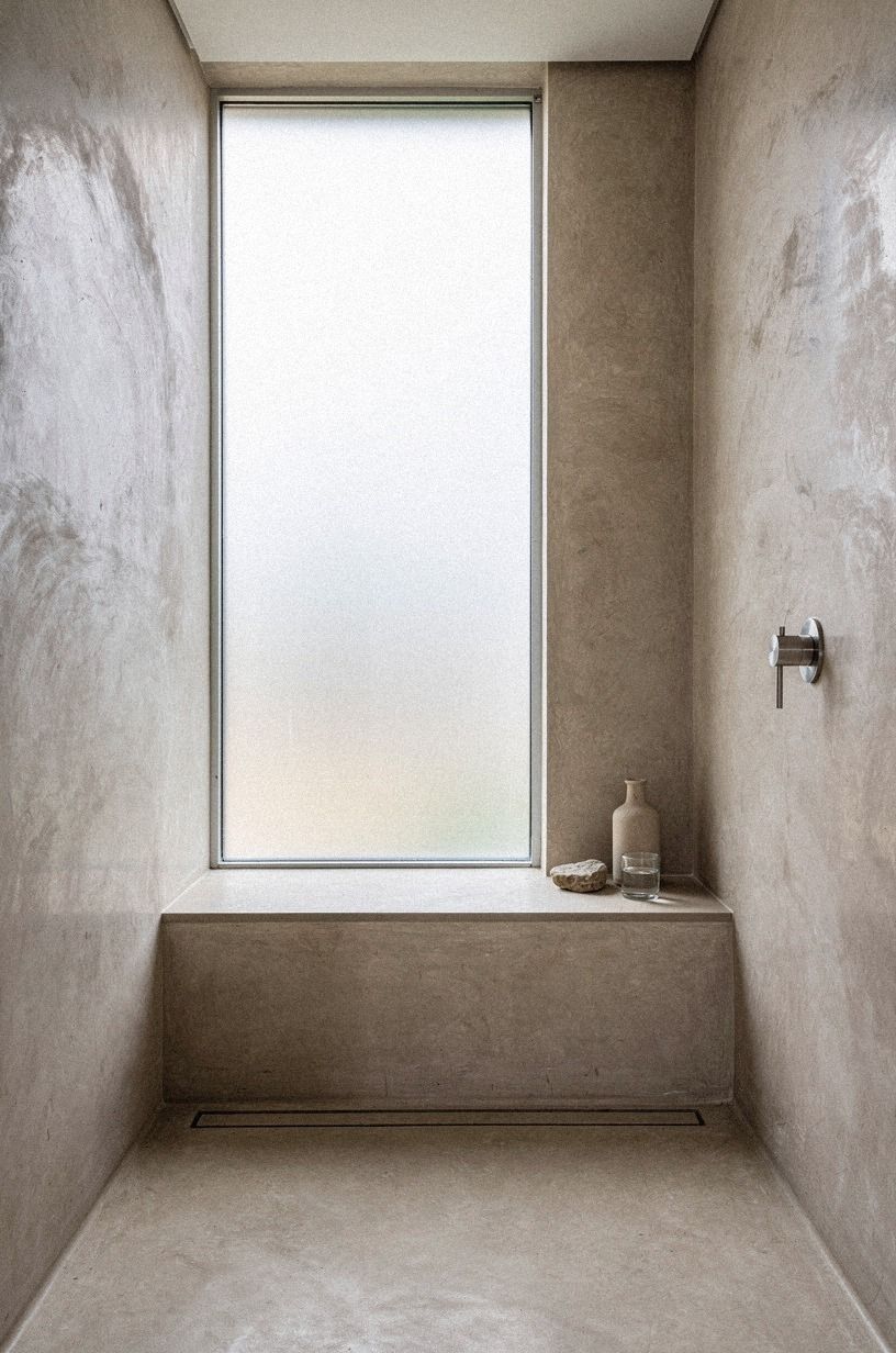 Add a slim ledge below the shower window
