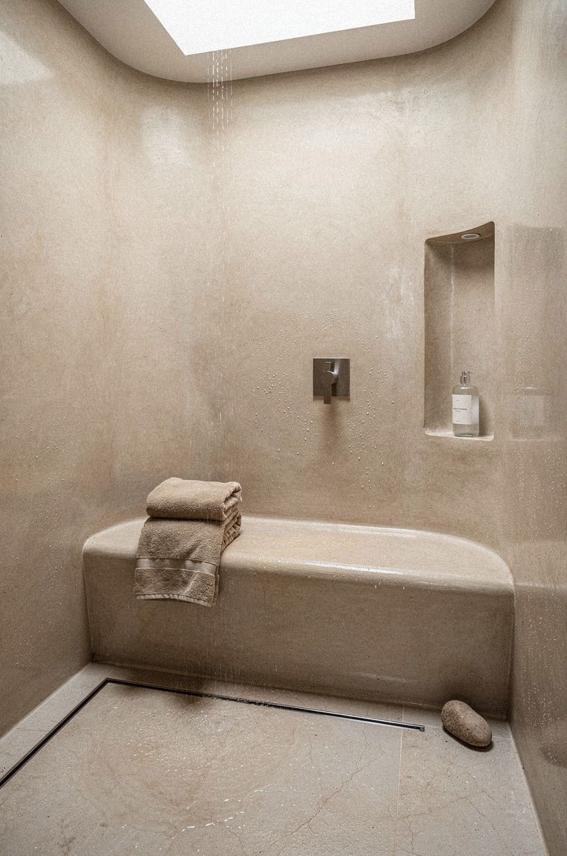 Pair tadelakt with a honed stone floor