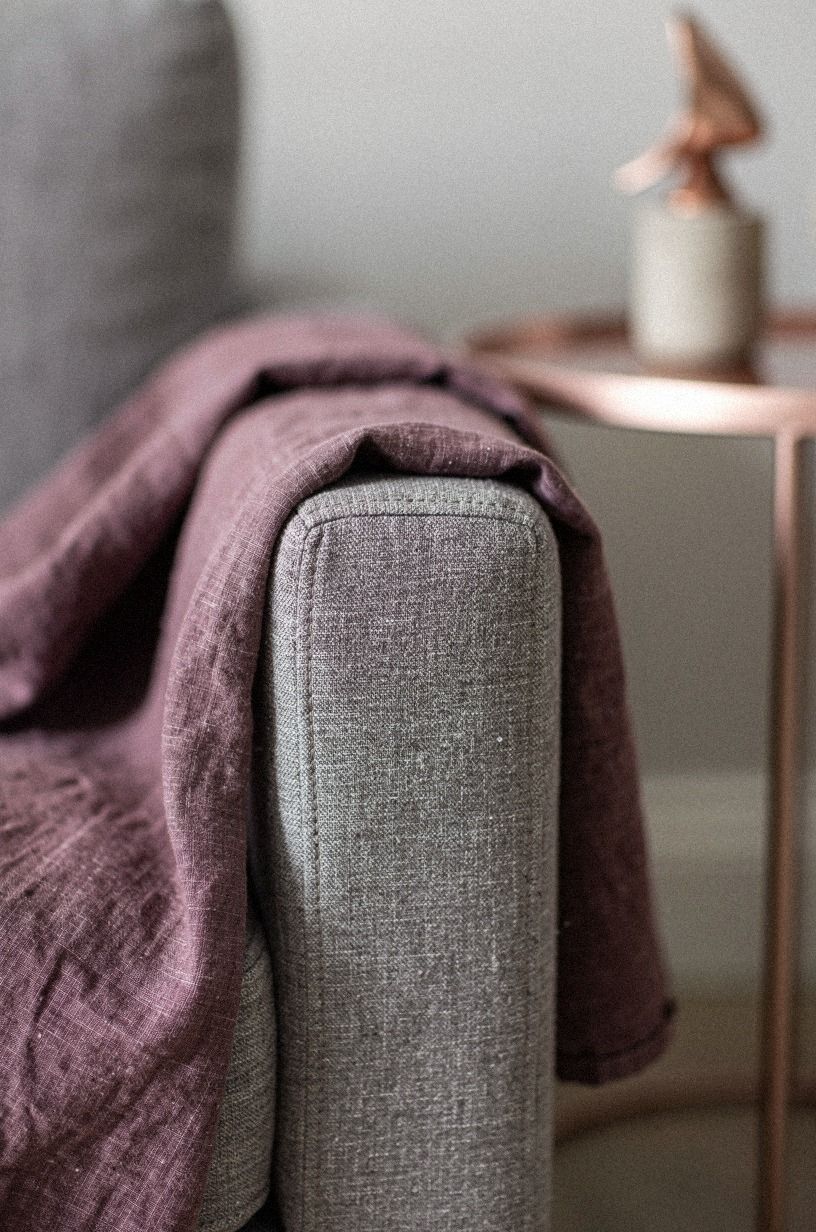 The room now, in one quiet detail, plum palette