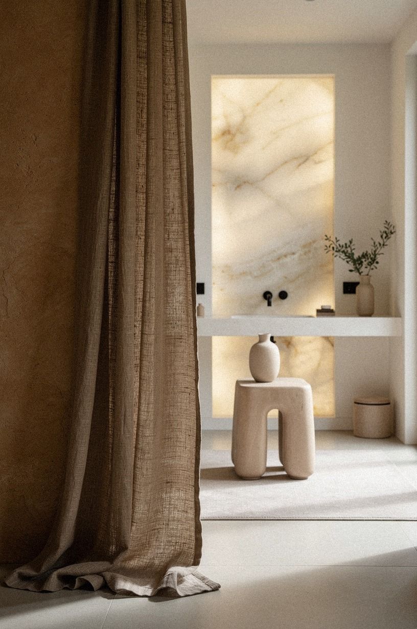 Let backlit translucent onyx warm the wall