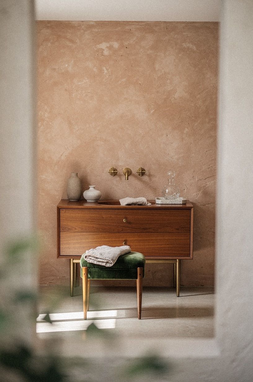 Start by stripping the wall back to something limewash can grab